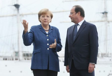 5月10日，成功瘦身后的默克尔会见来访的法国总统奥朗德。（GettyImages）