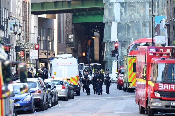 2017年6月3日深夜，英国伦敦发生连串攻击事件，武装警察目前已加强在街区巡逻。（AFP/Getty Images）