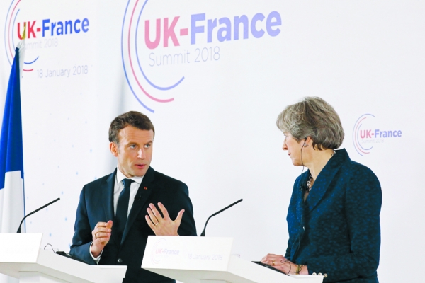 1月18日，法国总统马克龙与英国首相梅在伦敦西部的桑德斯特皇家军事学院举行新闻发布会。（AFP/Getty Images）