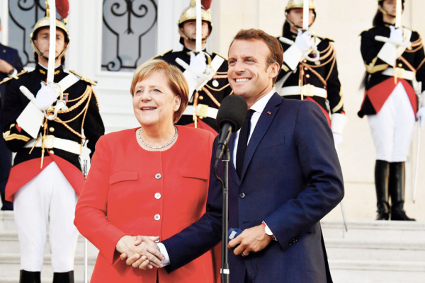 9月7日，法国总统马克龙与德国总理默克尔在马赛会晤。（AFP/Getty Images）