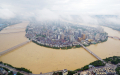 中国南方暴雨洪灾   洪水肆虐                         长江水位全线超警             大陆长江中下游沿江地区告急          