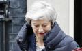 英国首相特蕾莎•梅于5月8日离开伦敦唐宁街10号。英国政府7日确认，英国将会参与欧洲议会选举。（AFP/Getty Images）