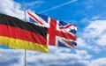 图为德国和英国国旗（123RF）