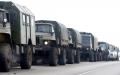 2月23日，俄罗斯军用卡车停在该国南部与顿涅茨克接壤的罗斯托夫地区。（STRINGER/AFP/Getty Images）
