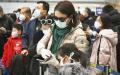 2020年2月1日，北京机场等待通过海关通道的中国人。（Greg Baker/AFP via Getty Images）