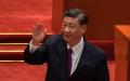 2022年4月8日，中共国家主席习近平在北京大会堂讲话后向台下观众挥手。
