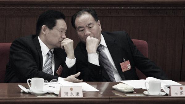 周永康（左）（图片来源：Feng Li/Getty Images）