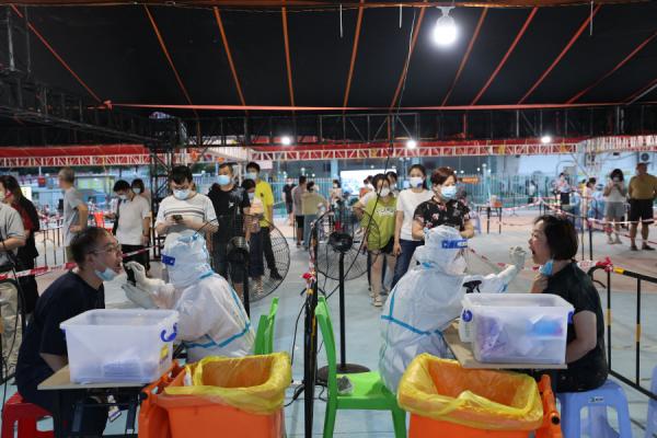 核酸检测示意图   （图片来源：STR/AFP via Getty Images）