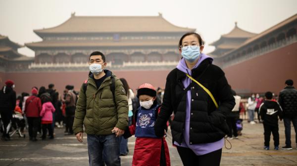 大年初二，在北京故宫门前的一家人。（图片来源：Getty Images）