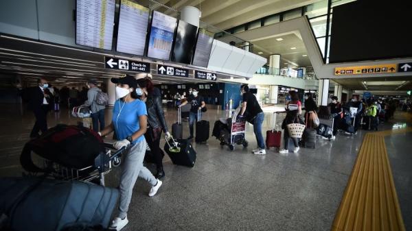 繁忙的机场航站楼（图片来源: Filippo MONTEFORTE / AFP via Getty Images）