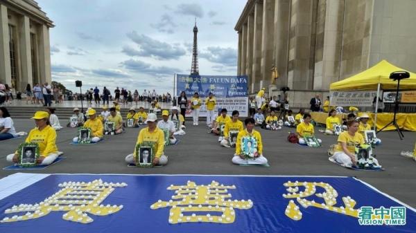 7月20日，法国法轮功学员在巴黎人权广场举行7.20反迫害24周年活动现场。（摄影：金美善/看中国）