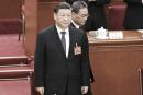 3月11日，习近平、李强出席人大会议。（GREG BAKER/POOL/AFP via Getty Images） 