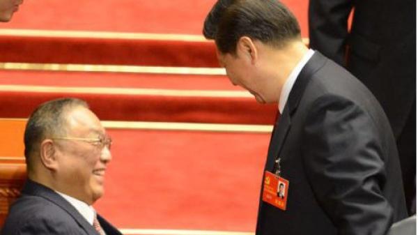 习近平和邓朴方在往年两会上（图片来源:GOH CHAI HIN/AFP/Getty Images）