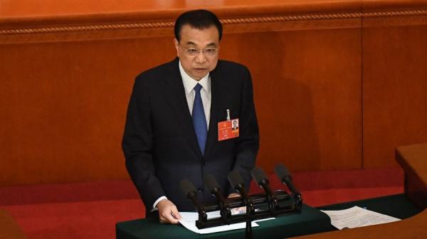 2020年5月22日，李克强在人大开幕会上做工作报告。（图片来源:LEO RAMIREZ/AFP via Getty Images）